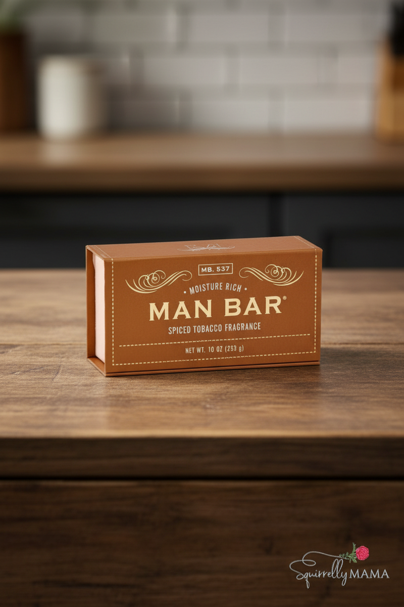 Man Bar jumbo soap packaging on a wooden counter