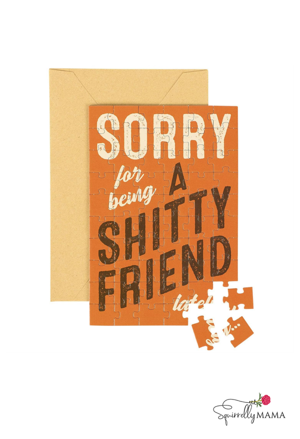 Orange Puzzle card that reads sorry for being a shitty friend