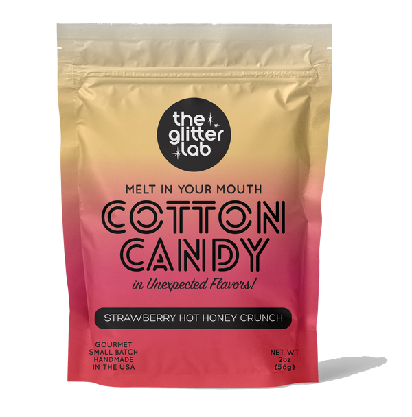 Packaging of 'Cotton Candy' from The Glitter Lab with gradient design and text.