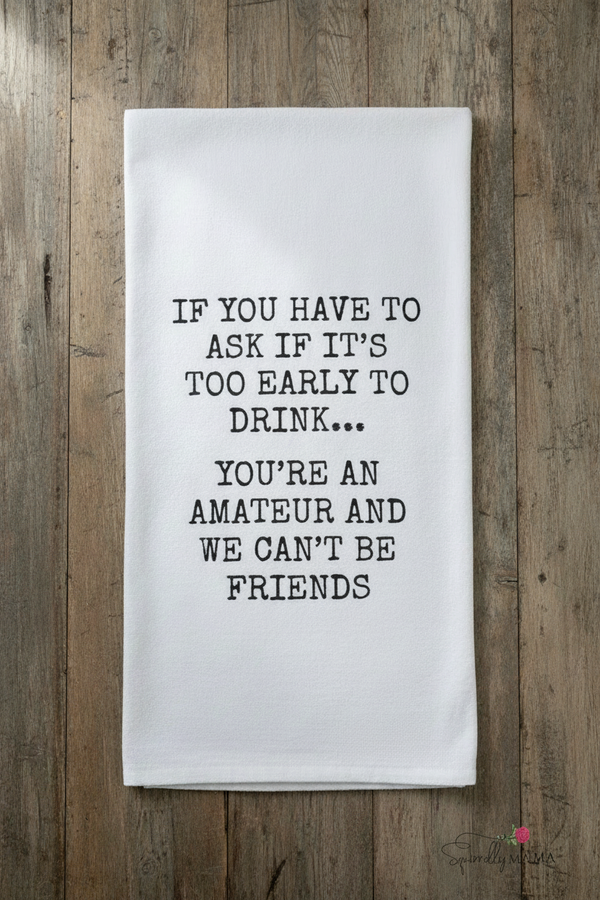 Folded towel with humorous text on a white background