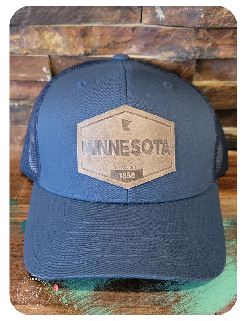 Navy minnesota hat with leather patch