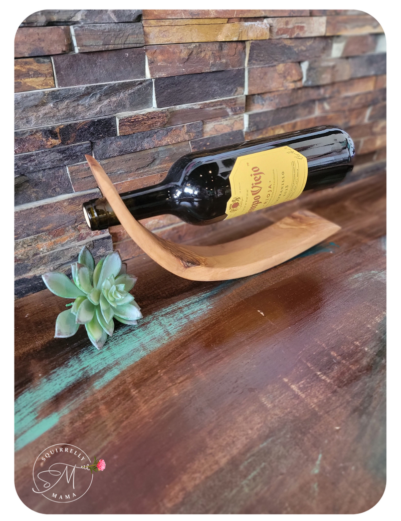 Wooden wine holding decor piece