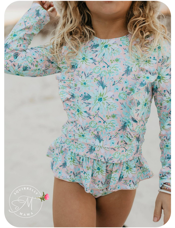 girls two pieced swimsuit with long sleeves